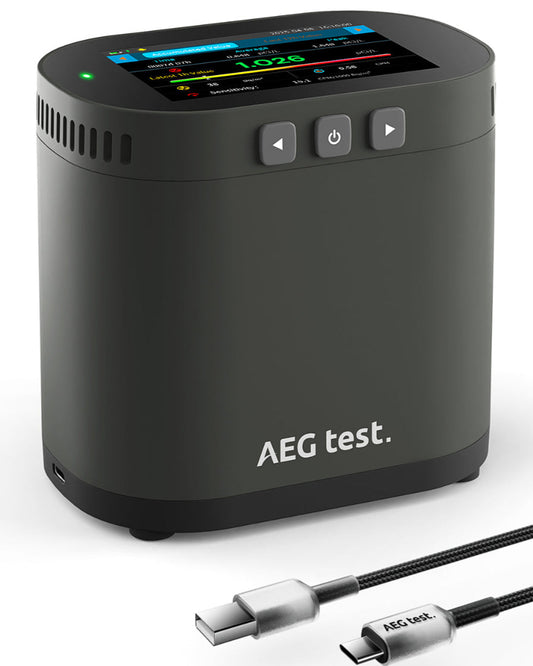 Black electronic device with display and buttons, labeled 'AEG test', on a white background.